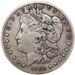 1884 S Morgan 90% Silver Dollar in VG/VF condition